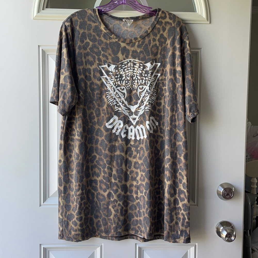 Leopard dream on shirt.